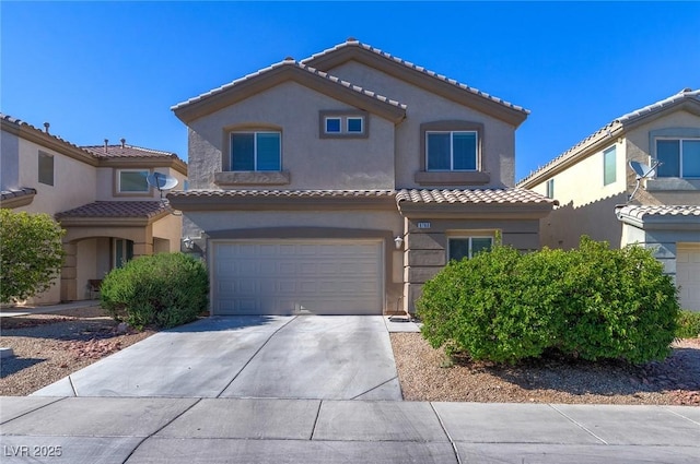 9780 Ziegler Ave, Las Vegas, NV 89148 - view of front facade with a garage, stucco siding, concrete driveway, and a tile roof