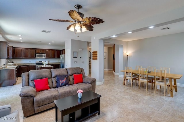 9780 Ziegler Ave, Las Vegas, NV 89148 - living room with recessed lighting, a ceiling fan, baseboards, and light tile patterned flooring