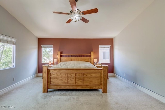 9780 Ziegler Ave, Las Vegas, NV 89148 - bedroom with light colored carpet, baseboards, and ceiling fan