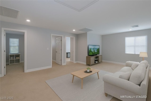 9780 Ziegler Ave, Las Vegas, NV 89148 - living area with light colored carpet, baseboards, recessed lighting, and healthy amount of natural light