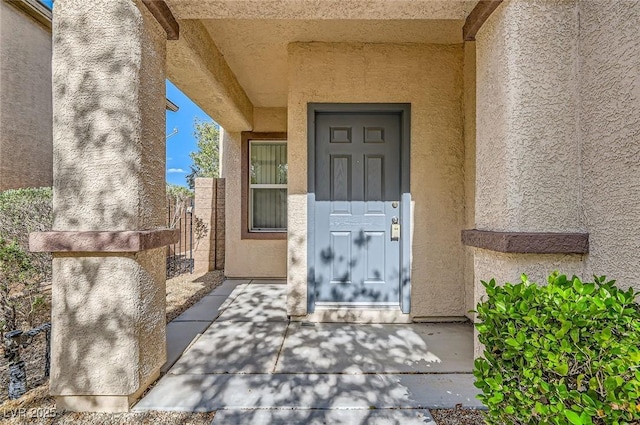 2728 Holmfault St, Henderson, NV 89044 - entrance to property featuring stucco siding