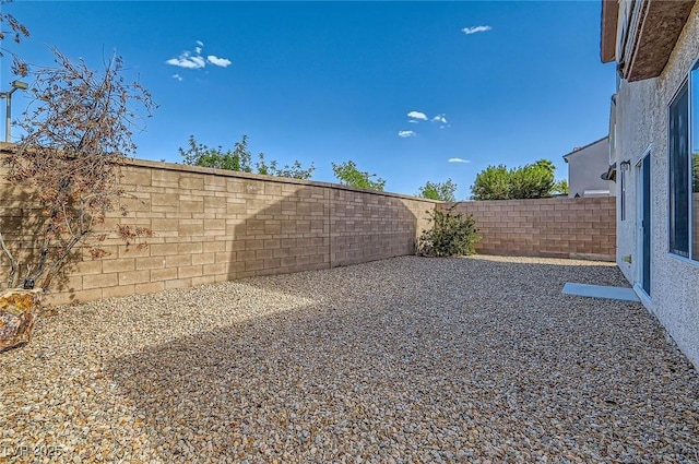 2728 Holmfault St, Henderson, NV 89044 - fenced backyard with a patio