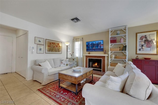 8388 Brad Oaks Cir, Las Vegas, NV 89123 - living area featuring light tile patterned flooring and a brick fireplace