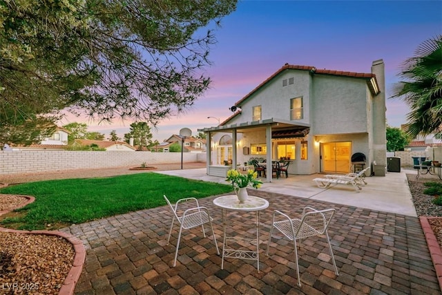 8388 Brad Oaks Cir, Las Vegas, NV 89123 - rear view of property with a patio, stucco siding, a tiled roof, and a chimney