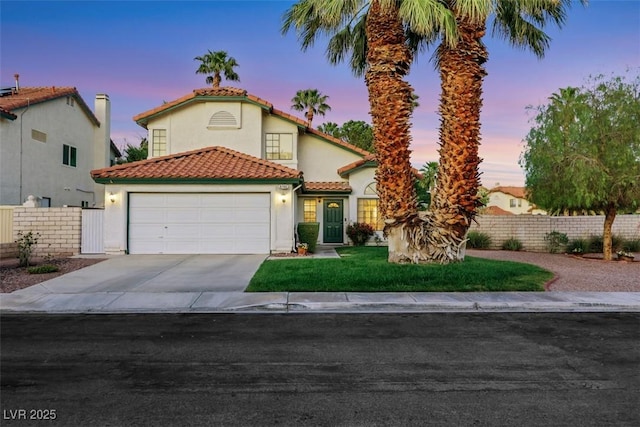 8388 Brad Oaks Cir, Las Vegas, NV 89123 - mediterranean / spanish home with fence, concrete driveway, a garage, a tile roof, and stucco siding