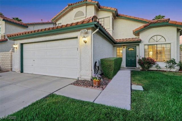 8388 Brad Oaks Cir, Las Vegas, NV 89123 - mediterranean / spanish-style house featuring a garage, driveway, a tile roof, a front yard, and stucco siding