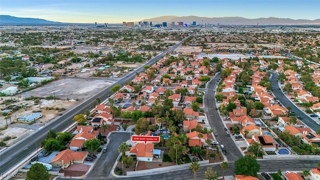 8388 Brad Oaks Cir, Las Vegas, NV 89123 - aerial view of property's location with a mountain backdrop