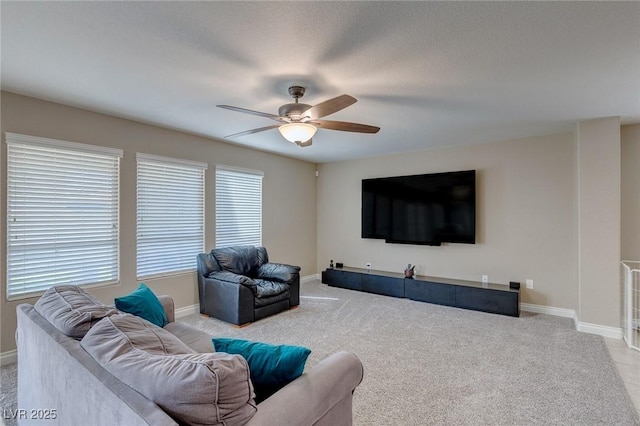 9469 Coral Shine Ct, Las Vegas, NV 89123 - carpeted living room featuring ceiling fan and baseboards