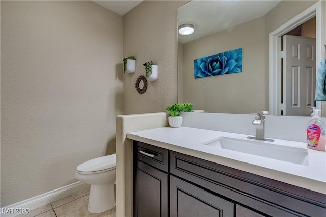 9469 Coral Shine Ct, Las Vegas, NV 89123 - bathroom with toilet, tile patterned flooring, vanity, and baseboards