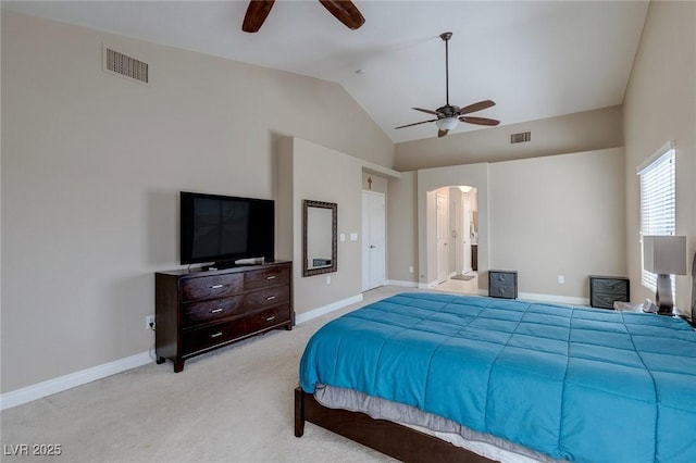 9469 Coral Shine Ct, Las Vegas, NV 89123 - bedroom featuring arched walkways, lofted ceiling, light colored carpet, baseboards, and a ceiling fan