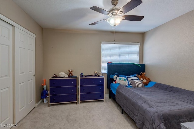 9469 Coral Shine Ct, Las Vegas, NV 89123 - bedroom featuring carpet, a ceiling fan, and a closet