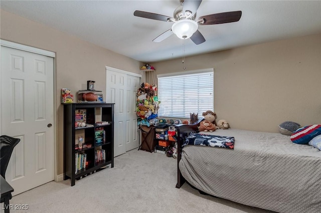 9469 Coral Shine Ct, Las Vegas, NV 89123 - bedroom featuring carpet floors, multiple closets, and ceiling fan