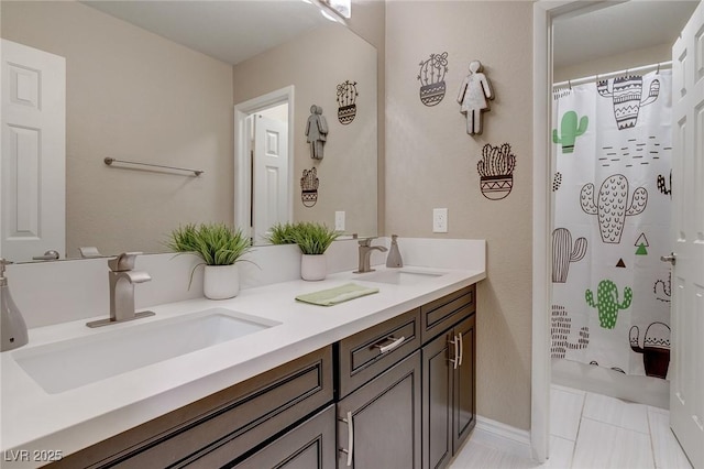 9469 Coral Shine Ct, Las Vegas, NV 89123 - bathroom featuring double vanity, a shower with shower curtain, and tile patterned floors