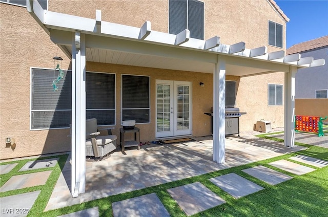 9469 Coral Shine Ct, Las Vegas, NV 89123 - rear view of property with stucco siding and a patio area