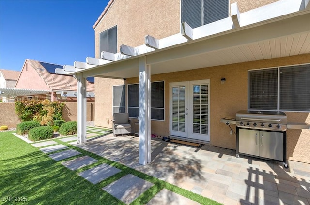 9469 Coral Shine Ct, Las Vegas, NV 89123 - back of house featuring stucco siding, a patio area, french doors, fence, and a pergola