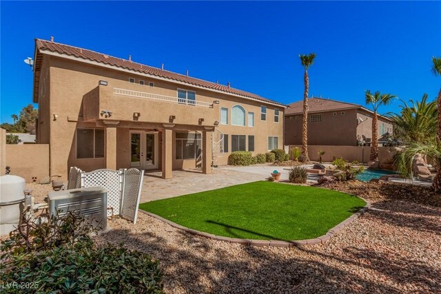 8809 Barium Rock Ave, Las Vegas, NV 89143 - back of house featuring french doors, stucco siding, and a patio