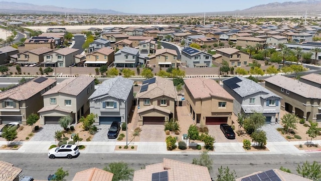 aerial view of residential area with mountains