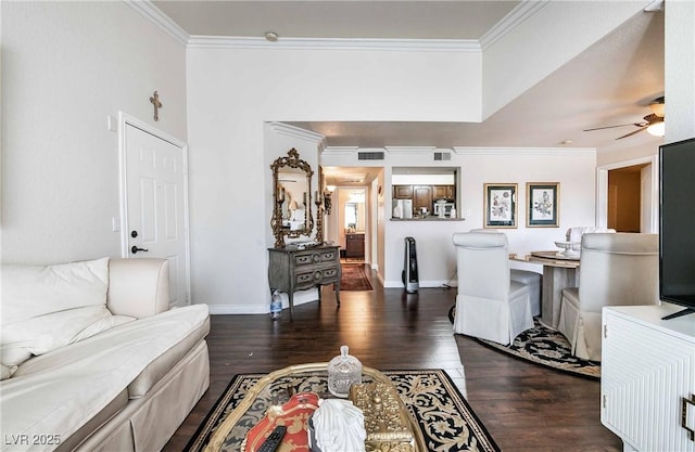 8101 W Flamingo Rd Unit 2006, Las Vegas, NV 89147 - living room featuring crown molding, wood finished floors, ceiling fan, and baseboards