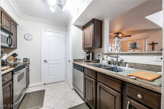 8101 W Flamingo Rd Unit 2006, Las Vegas, NV 89147 - kitchen with stainless steel appliances, a sink, dark brown cabinetry, crown molding, and a ceiling fan