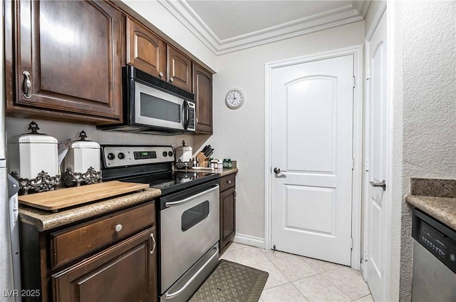 8101 W Flamingo Rd Unit 2006, Las Vegas, NV 89147 - kitchen featuring appliances with stainless steel finishes, ornamental molding, light tile patterned floors, and dark brown cabinets