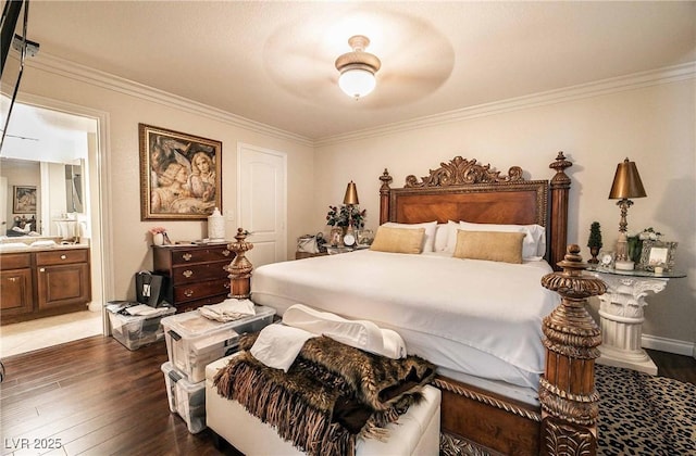 8101 W Flamingo Rd Unit 2006, Las Vegas, NV 89147 - bedroom featuring dark wood-style flooring, crown molding, ensuite bath, and baseboards