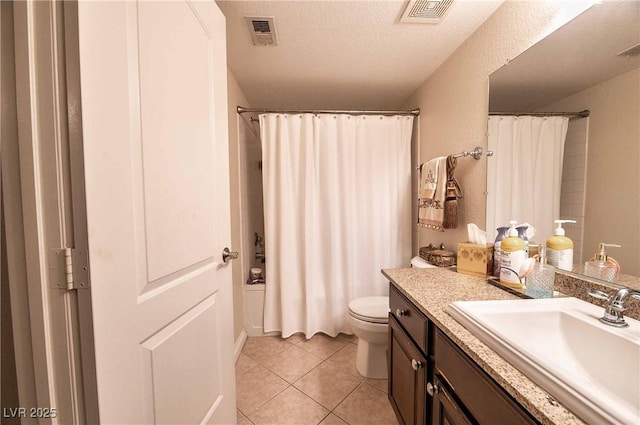 8101 W Flamingo Rd Unit 2006, Las Vegas, NV 89147 - full bath featuring tile patterned floors, vanity, toilet, a textured ceiling, and shower / tub combo with curtain