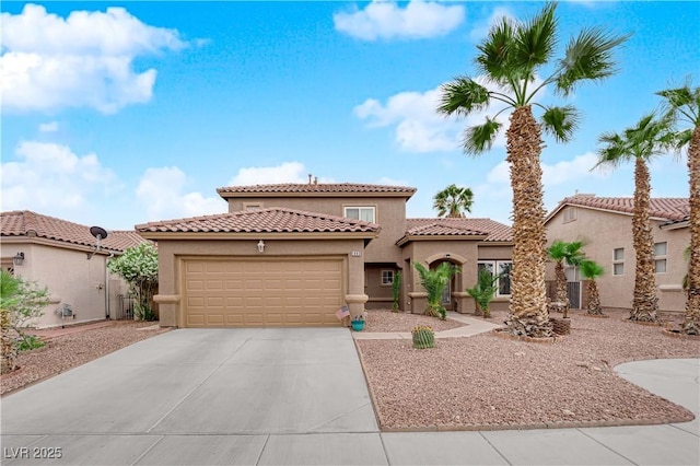 1893 Donnington Ct, Las Vegas, NV 89123 - mediterranean / spanish home with stucco siding, a garage, a tiled roof, and driveway