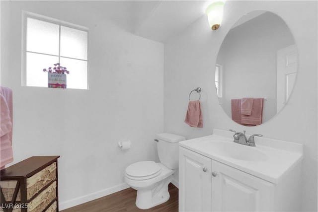 1893 Donnington Ct, Las Vegas, NV 89123 - half bath with wood finished floors, healthy amount of natural light, toilet, and vanity