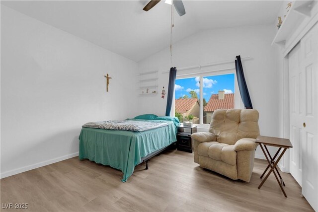 1893 Donnington Ct, Las Vegas, NV 89123 - bedroom with light wood-style floors, access to exterior, a ceiling fan, baseboards, and high vaulted ceiling