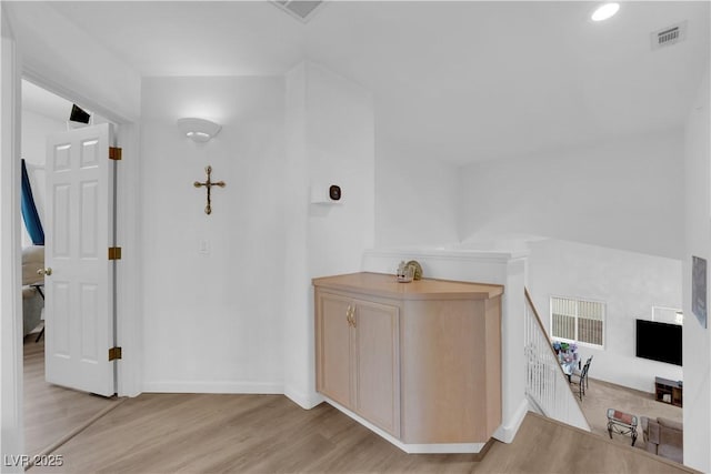 1893 Donnington Ct, Las Vegas, NV 89123 - hall featuring light wood-type flooring, baseboards, an upstairs landing, and recessed lighting