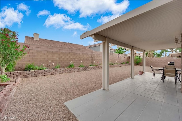 1893 Donnington Ct, Las Vegas, NV 89123 - view of patio with outdoor dining area and a fenced backyard