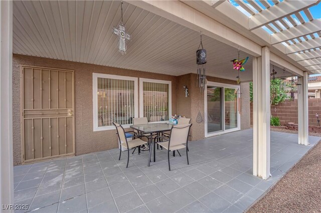 1893 Donnington Ct, Las Vegas, NV 89123 - view of patio featuring a pergola, outdoor dining space, and fence