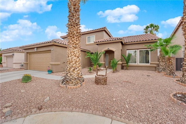 1893 Donnington Ct, Las Vegas, NV 89123 - mediterranean / spanish-style house with stucco siding, driveway, a tiled roof, and a garage