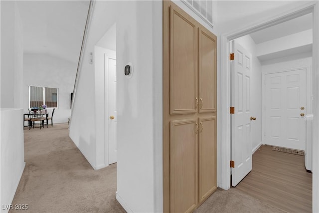 1893 Donnington Ct, Las Vegas, NV 89123 - hallway with vaulted ceiling, light colored carpet, and baseboards