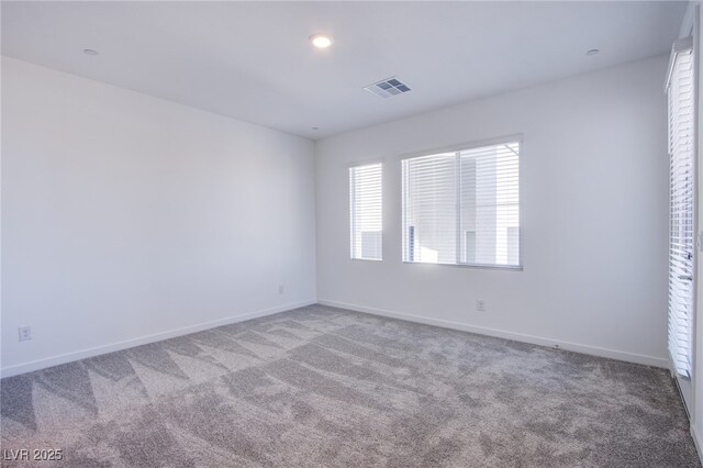 145 Aqua Commons Ln, Henderson, NV 89015 - empty room featuring carpet flooring and baseboards