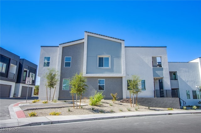 145 Aqua Commons Ln, Henderson, NV 89015 - view of front of house featuring stucco siding