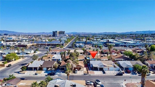 aerial perspective of suburban area featuring a mountainous background