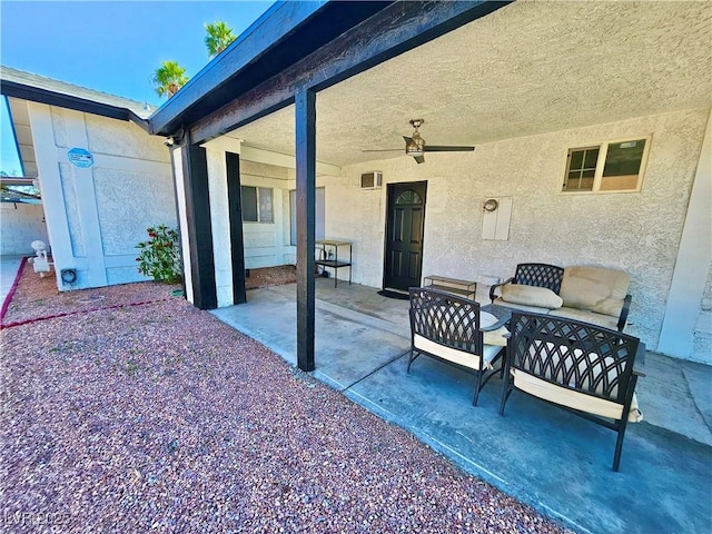 view of patio featuring a ceiling fan