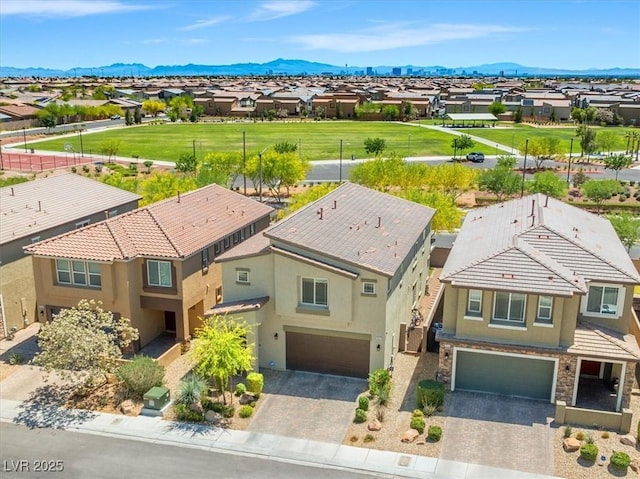 aerial perspective of suburban area with mountains