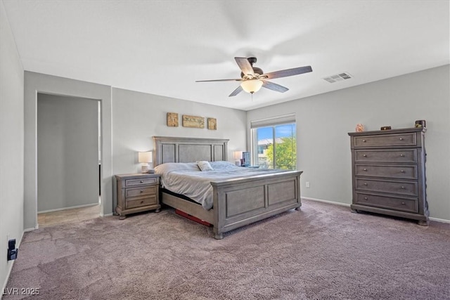 bedroom featuring carpet floors, a ceiling fan, and baseboards