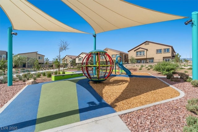 community jungle gym featuring a residential view