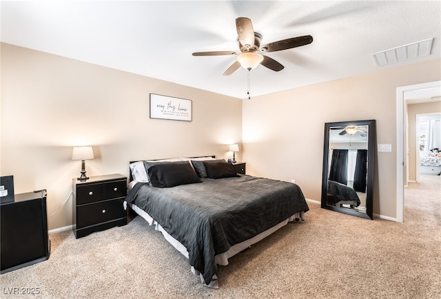 bedroom with light carpet, baseboards, and ceiling fan