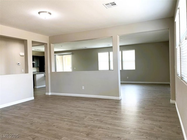 7861 Hamilton Pool Dr, Las Vegas, NV 89113 - unfurnished room featuring wood finished floors and baseboards