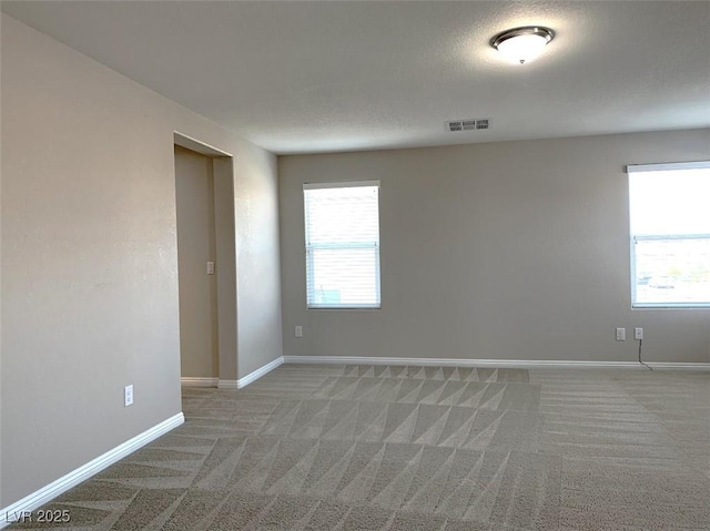 7861 Hamilton Pool Dr, Las Vegas, NV 89113 - spare room with light carpet and baseboards