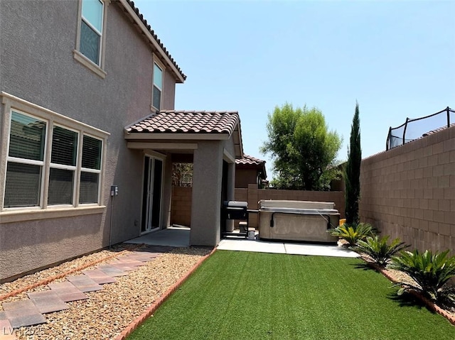 7861 Hamilton Pool Dr, Las Vegas, NV 89113 - view of yard featuring a hot tub and a patio area