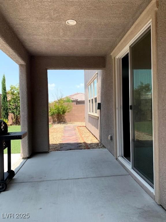 7861 Hamilton Pool Dr, Las Vegas, NV 89113 - view of patio / terrace featuring fence