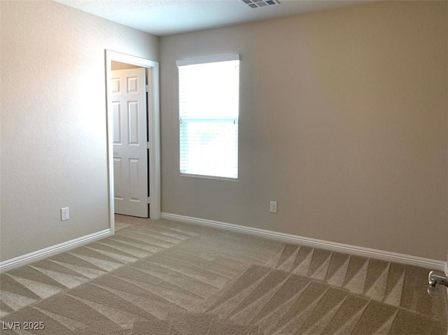 7861 Hamilton Pool Dr, Las Vegas, NV 89113 - carpeted spare room with baseboards