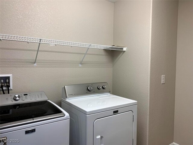 7861 Hamilton Pool Dr, Las Vegas, NV 89113 - washroom with washing machine and dryer