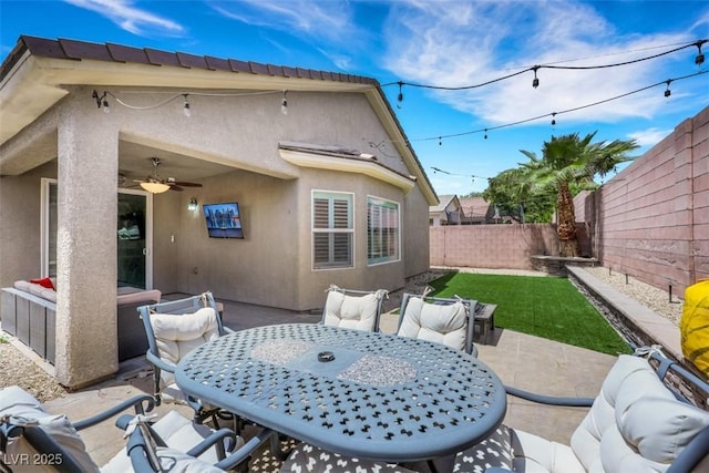 8836 Martin Downs Pl, Las Vegas, NV 89131 - view of patio / terrace with a ceiling fan, outdoor dining space, and a fenced backyard