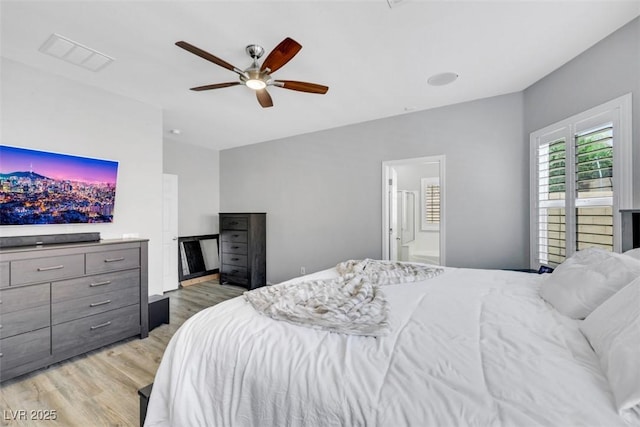 8836 Martin Downs Pl, Las Vegas, NV 89131 - bedroom featuring light wood-style floors, a ceiling fan, and ensuite bath